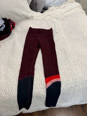 The Upside Burgundy Colorblock Girls' Leggings with Red and Pink Accents